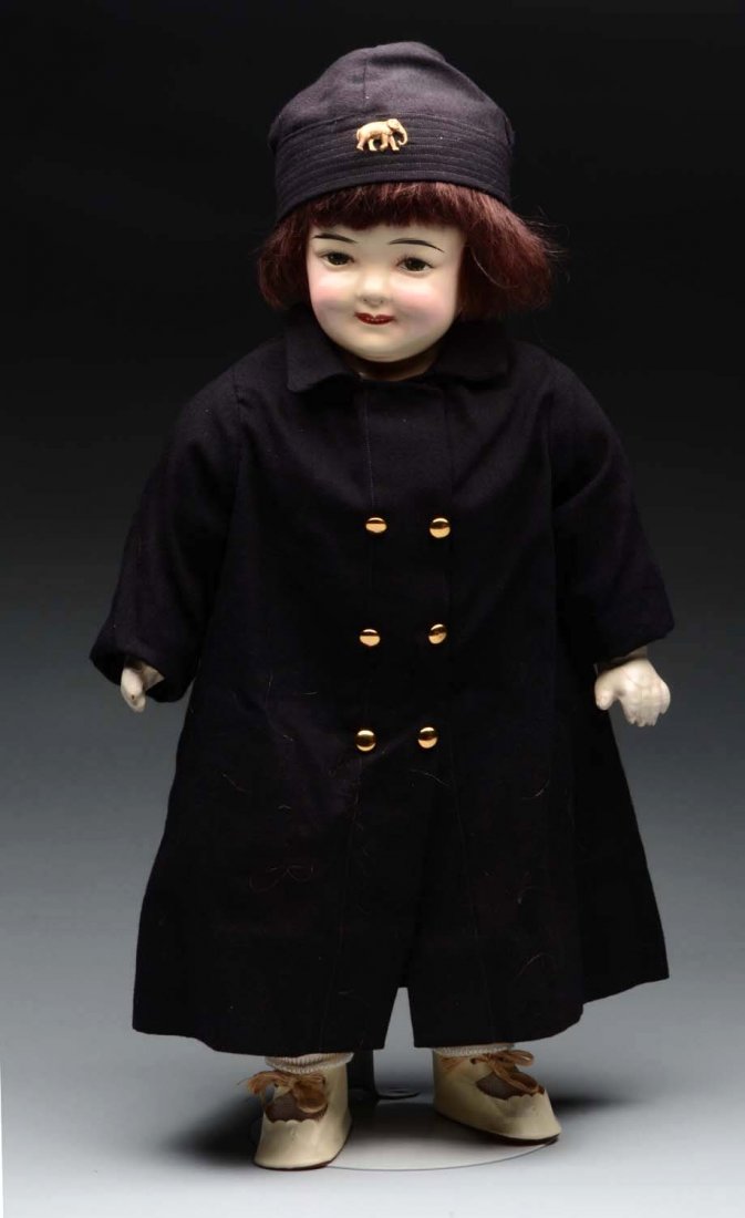Amberg “Baby Peggy Montgomery”.: 1924. Portrait doll by Louis Amberg Co. of the popular movie star “Baby Peggy.” Composition shoulder head with smiling face (several light crazing lines), excellent dark brown bobbed mohair wig, p