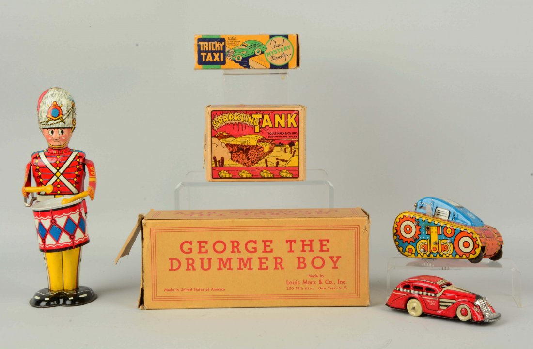 Lot Of 3: Marx Wind-Up Toys.: Includes one Marx Tricky Taxi without wind-up key, and comes with original box that is missing one end; Marx Sparkling Tank that works with colorful original box; and Marx George the Drummer Boy in wo