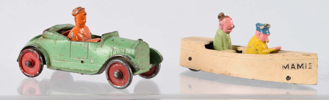 Lot Of 2: Tootsietoy Mamie Boat & Car.: Articulated boat needs to have pins replaced. Paint is original with some paint chips. The automobile also needs some pics replaced. Some scratches and paint chips. (Good - Very Good). Each: 3-1/4'' L