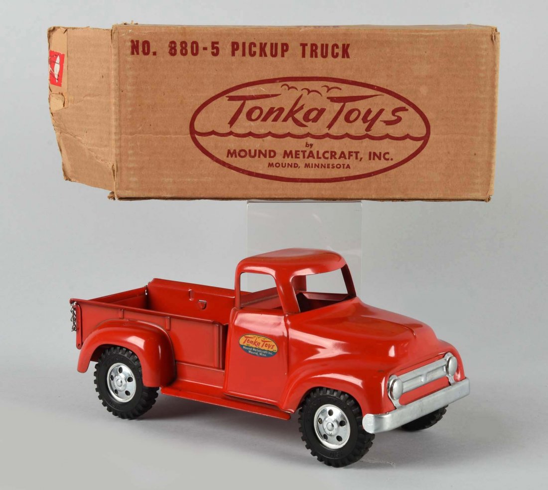 Tonka No. 880-5 Pickup Truck.: Circa mid 1950's. In near mint condition with box rub on the roof. Original box is creased and shows wear. (Near Mint). Box : 13" L.