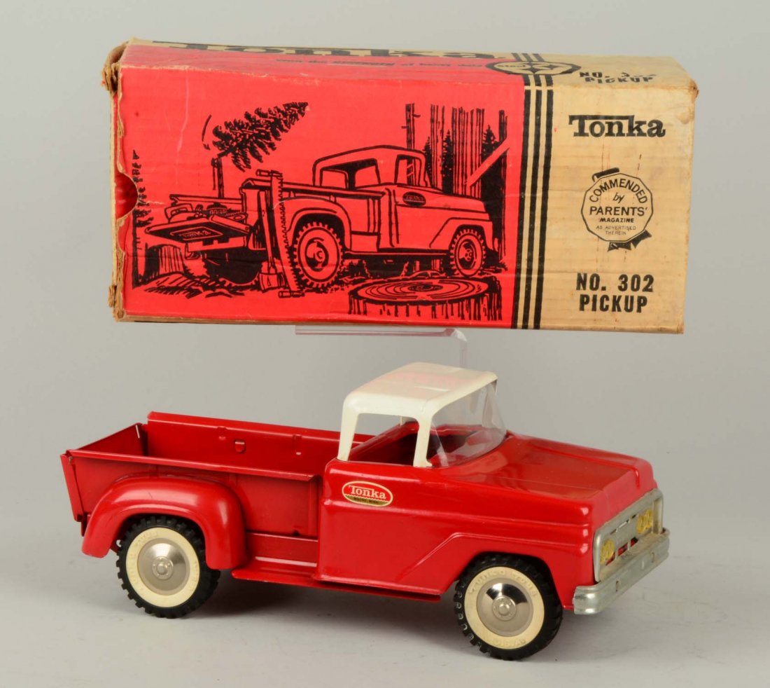 – Tonka No. 302 Pickup.: Like new in the original box. Circa 1965. Box is in very good condition with all flaps. (Excellent-Near Mint). Box : 13" L.