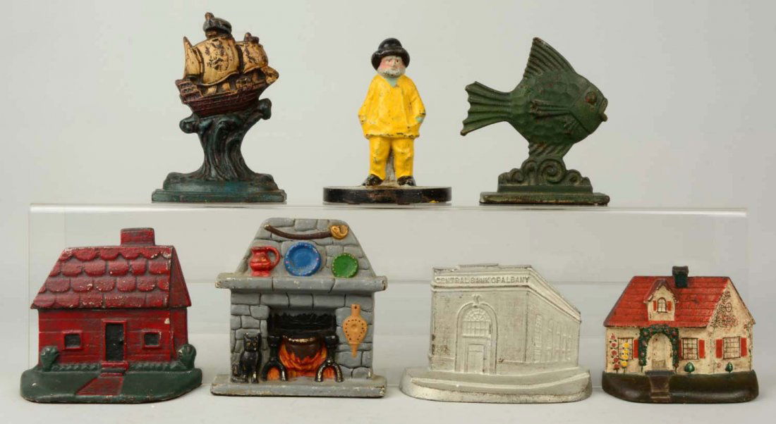 Lot of 7: Cast Iron Assorted Bookends. (1 of 1)