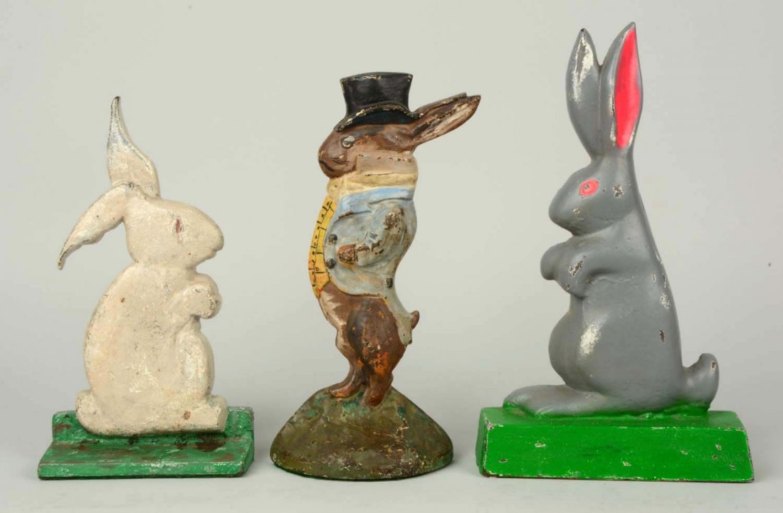 Lot of 3: Cast Iron Assorted Rabbit Doorstops. (1 of 1)