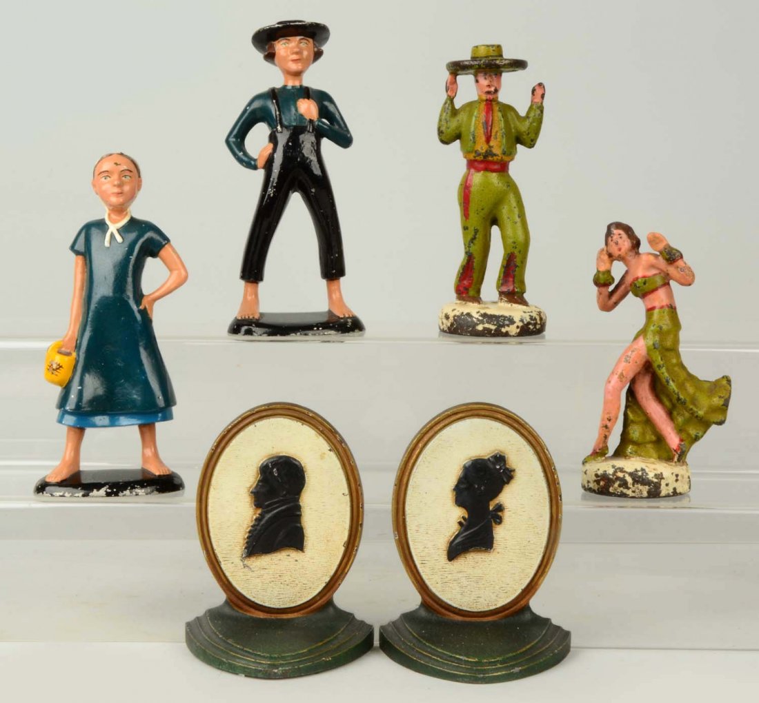 Lot of 3 pairs: Cast Iron Assorted Doorstops. (1 of 1)