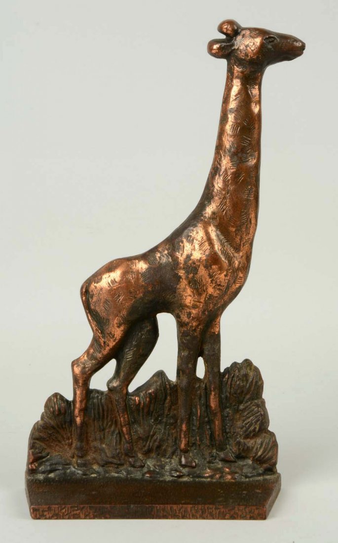 Cast Iron Giraffe Standing in Trees Doorstop.: Signed, “Verona, 69, Pat. Pend.” Copper electroplated over cast iron. Book Example. (Excellent). 13" T.