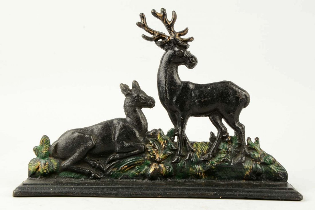 Cast Iron Elk Doorstop.: English. Depicts Lying down Doe and Buck. Book Example. (Very Good). 8 - 1/2" T.
