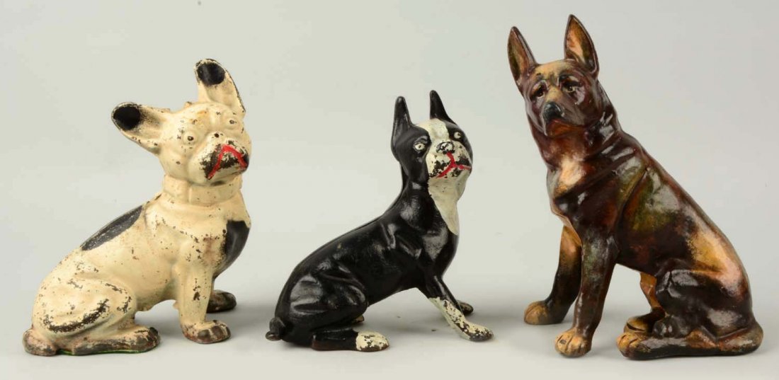 Lot of 3: Cast Iron Assorted Dog Doorstops. (1 of 1)