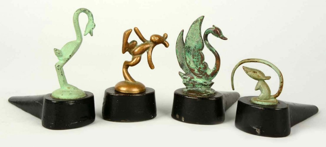 Lot of 4: Cast Iron Assorted Doorstops. (1 of 2)