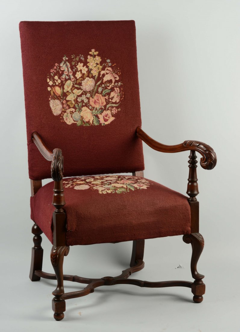 Embroidered Chair.: This lot is of an embroidered chair. The chair consists of a maroon back rest and seat with a floral needlepoint scene on both. Minor wear present along with some color fading, and nicks to the wood.