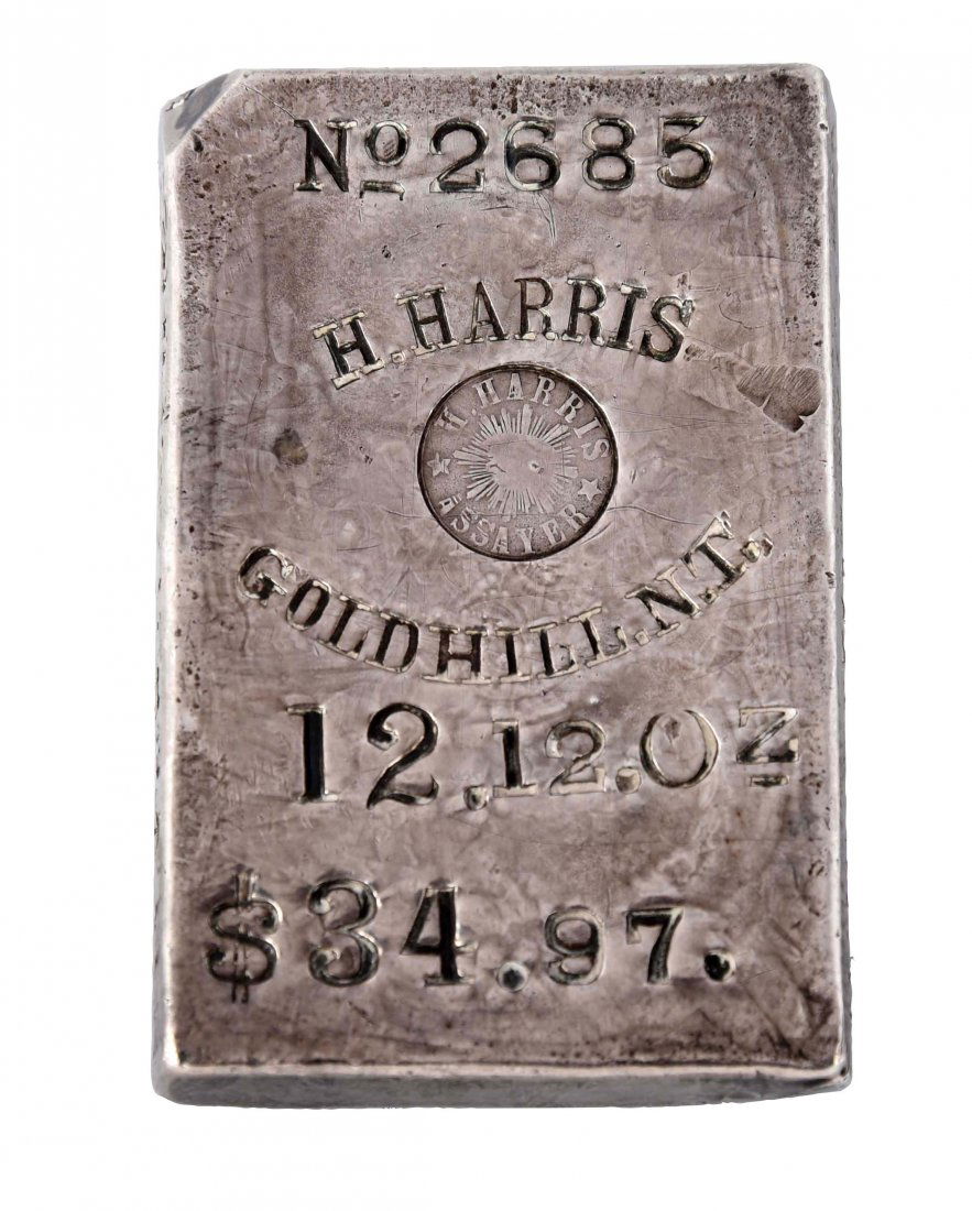 H. Harris Silver Ingot.: 12.12 oz. Extremely rare. Provenance the John Ford Stacks collection. (Excellent). 2 -1/2" x 1 -3/4".