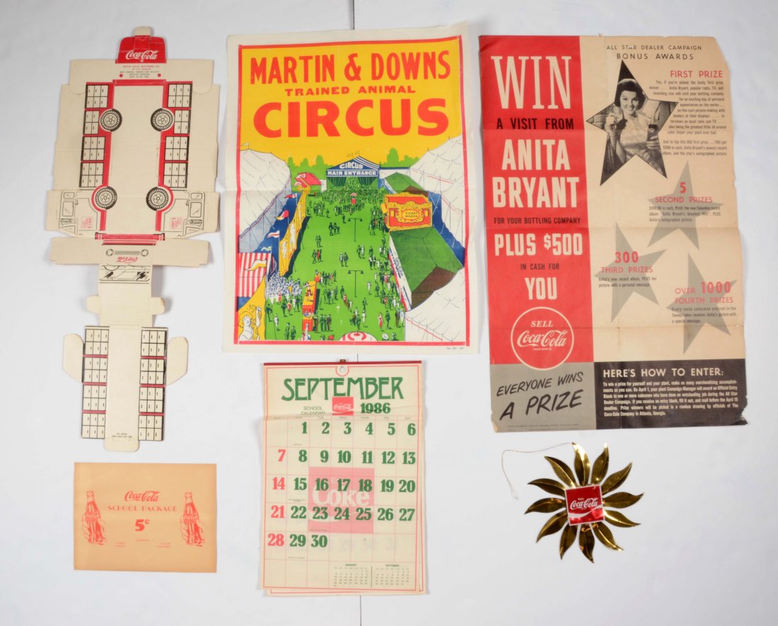 Lot Of Coca-Cola Advertising Pieces.: Included is a 1986 calendar, a fold up delivery truck, and a few other items. Some mild soiling and wear. (Good - Very Good). Largest: 28" x 21".