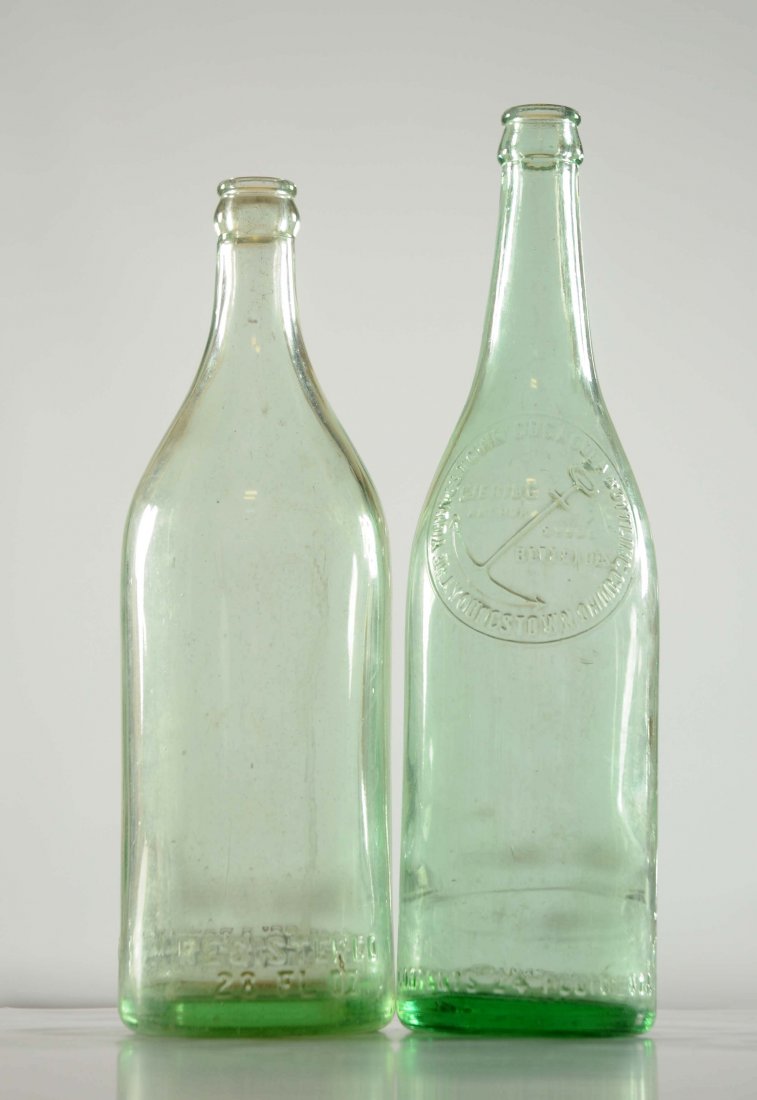 Lot Of 2: Early Coca - Cola Over Sized Bottles.: One of the bottles is from Fall River, Massachusetts and the other is from Youngstown, Ohio. Both bottles have some soiling and residue to the inside. No chips. Both display quite well. (Very Good). L