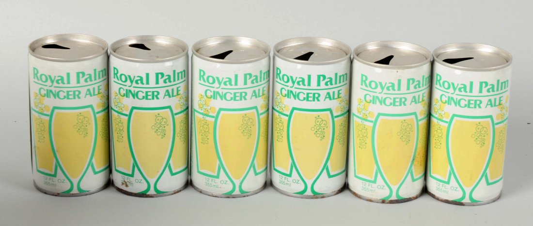 6 Cans Of Royal Palm Ginger Ale.: These are all pull tab cans. Some soiling with a few minor dents. (Very Good). Box : 8" L.