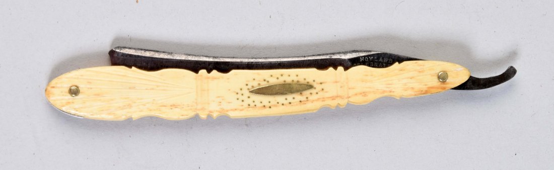 Carved Bone Straight Razor w/ Penning.: Noyland & Son hand carved smooth white bone handled with "penning" decoration. Circa 1840 to 1850. (Excellent). 6 -1/4" L.