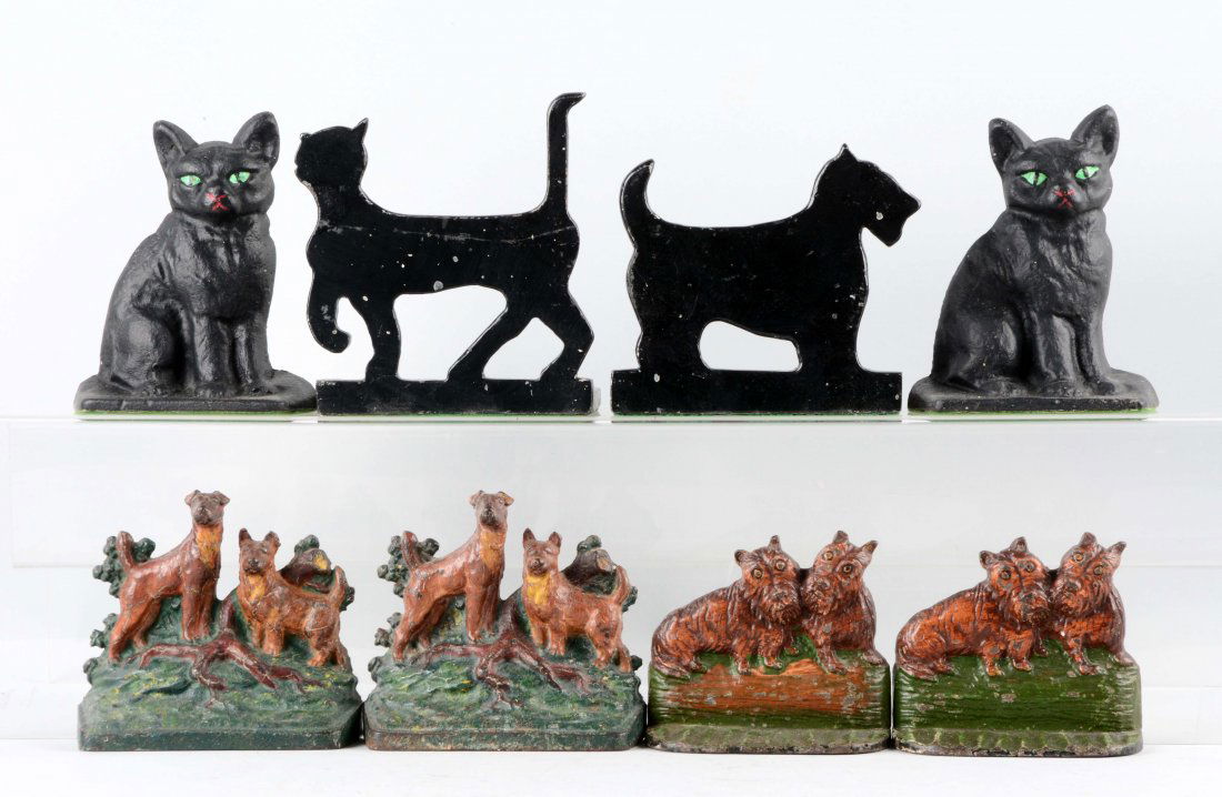 Lot of 4 Pairs: Cast Iron Assorted Bookends. (1 of 1)