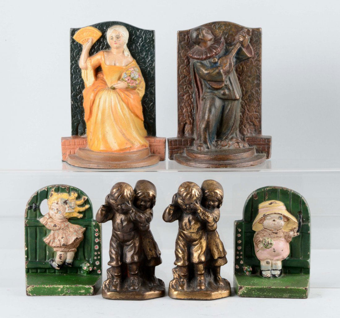 Lot of 3 Pairs: Cast Iron Assorted Bookends. (1 of 1)