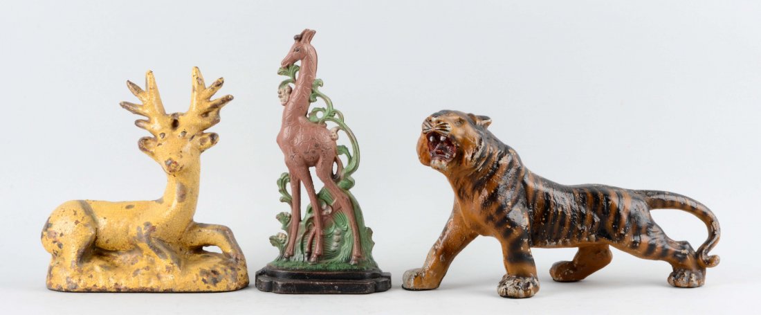 Lot of 3: Cast Iron Assorted Doorstops. (1 of 1)