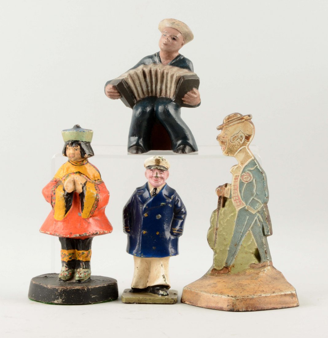 Lot of 4: Cast Iron Assorted Figural Doorstops. (1 of 1)