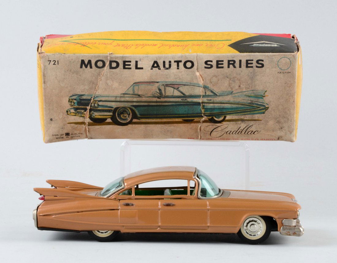 Japanese Tin Litho Friction Cadillac Toy. (1 of 2)