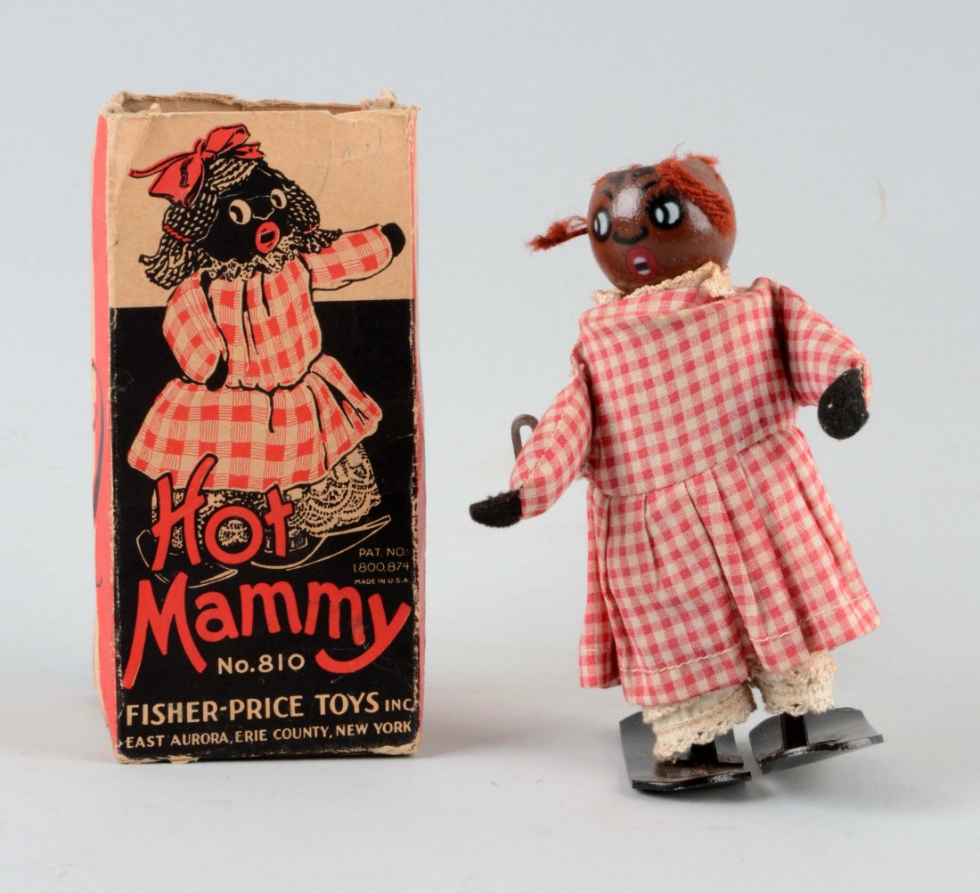 Fischer Price Wind Up Hot Mammy Toy.: Includes original box, complete except for top flap, some creasing and wear. Toy has original clothes, some original hair is missing. (Very Good). Box: 6 -1/2" x 3 -1/4".