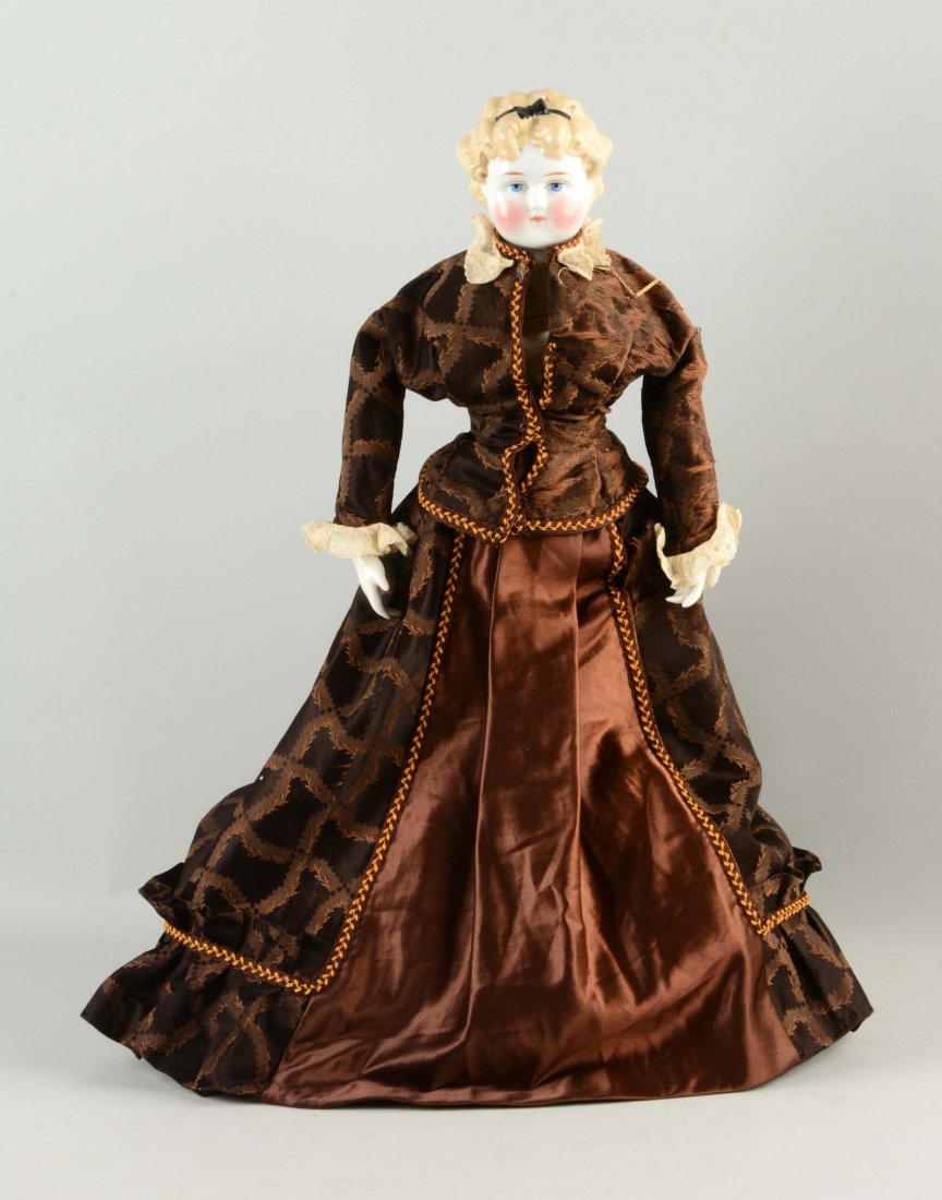 Blonde German China Head Doll. (1 of 2)