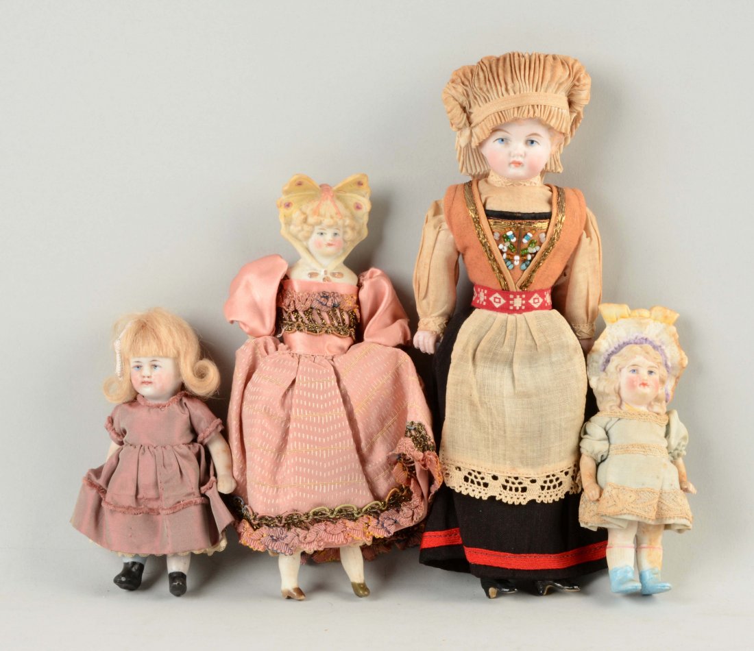 Lot of 4: Small Bisque Dolls. (1 of 1)