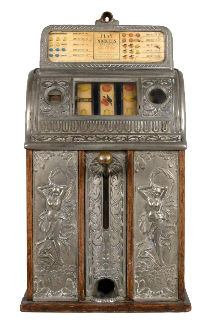 **5¢ Caille Bros. Center Pull Victory Bell Nude Front: A lovely example of a center pull slot machine produced by Caille Bros. in the 1920s. This model features the "Nude Front" design, where the center pull is flanked on either side by the image of a wom