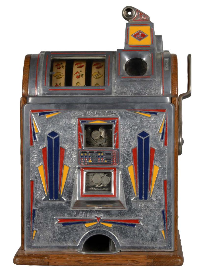 **5¢ Jennings Victoria Slot Machine: Having a metal front with Art Deco designs in red, yellow, and blue. This machine has been restored. Circa 1933. Includes 2 keys. The upper back panel is stuck. (Very Good - Excellent). 15"D. x 15"W. 