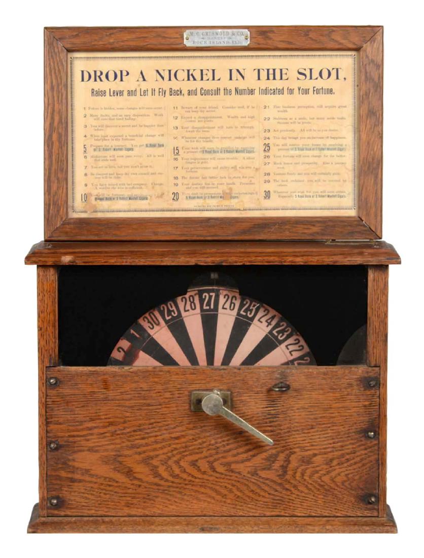 5¢ M.O. Griswold & Co. Wheel of Fortune Trade: Produced in the early 1900s by M.O. Griswold & Co. Players drop a nickel in the slot and raise the lever to spin the wheel. The numbers on the wheel correspond with the fortunes on the marquee. The ma