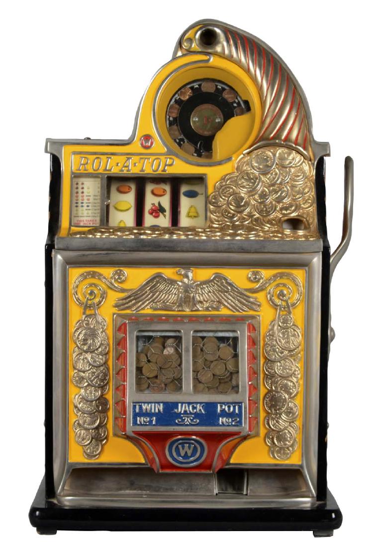**1¢ Watling Mfg. Co. Rol-A-Top Twin Jackpot Slot: Also referred to as the Coin Front, this three reel escalator bell machine is a highly restored example with refinished cabinet and repainted castings. Denomination tag, reel strips, and cash box are