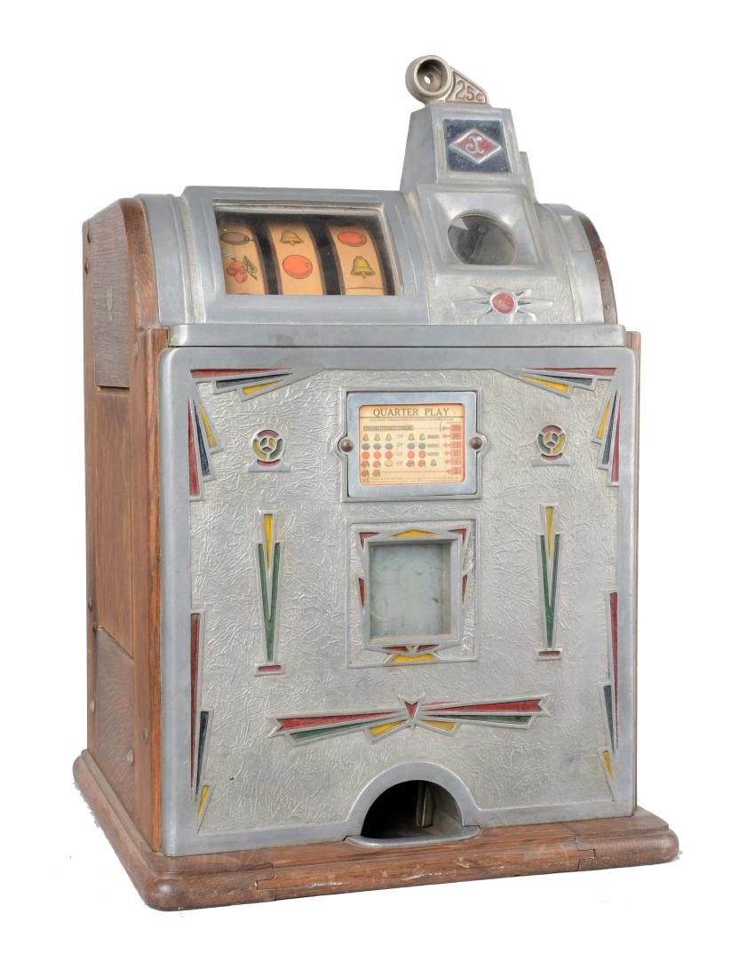 **25¢ Jennings Victoria Jackpot Model B Slot Machine: Manufactured by O.D. Jennings in 1931. In original, unrestored condition. Shows wear commensurate with age and use. Includes keys. (Very Good). 15" D. x 15" W. x 24" T.