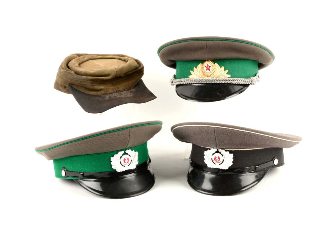 Lot Of 4: 3-Soviet/USSR Military Caps and 1960s Kepi: Including three Cold War era, visored Soviet/USSR Army military caps, all with gray bodies. All in VG condition. 1) officer's cap with green hatband and piping, gold wreath with red star device in fro