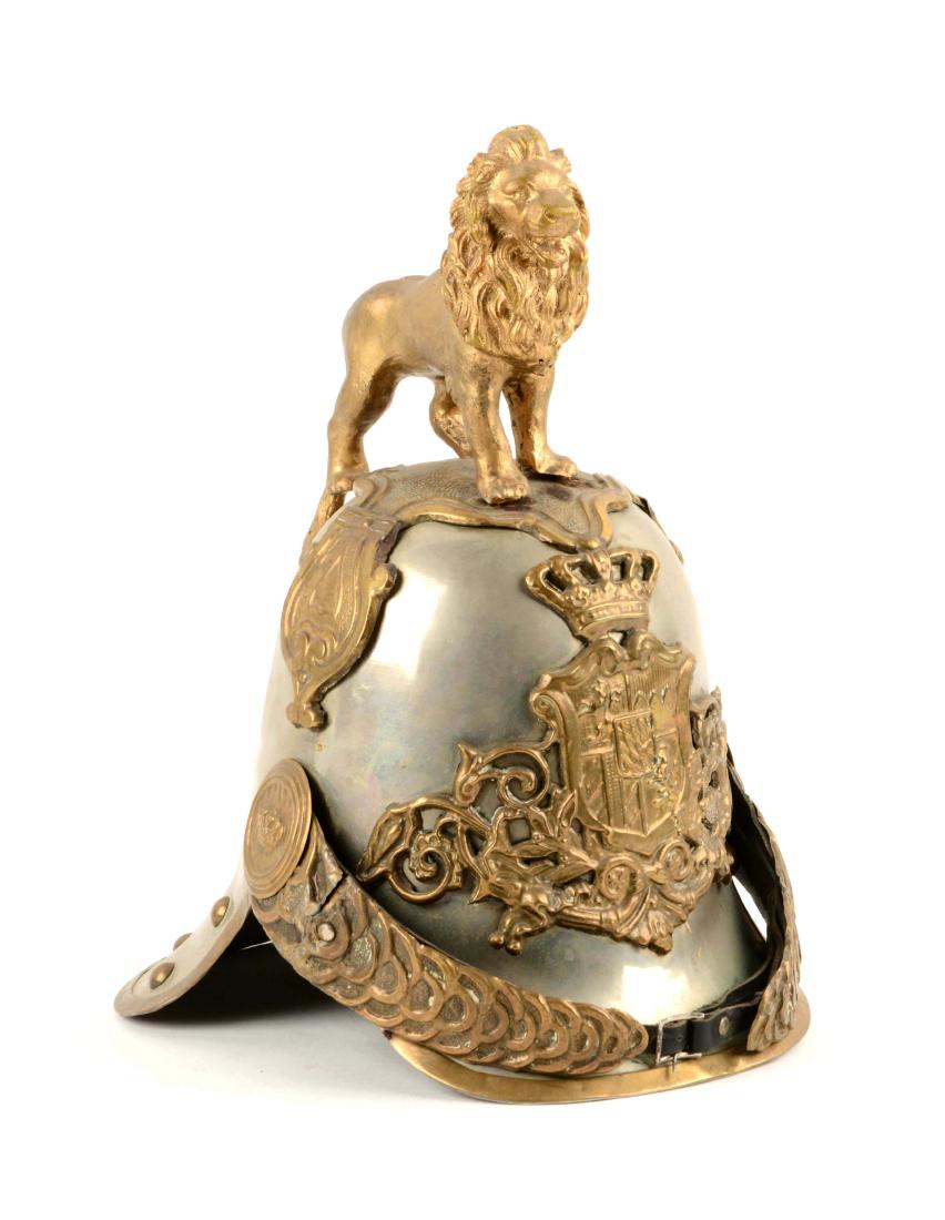 Model 1852 Helmet for Royal Hartschier Life Guard: Ceremonial style or theatrical Bavarian helmet for non-commissioned officers or soldiers with rampant lion. Tombac alloy skull with gilded mountings, trim, and rivets, with the arms of the Bavarian st