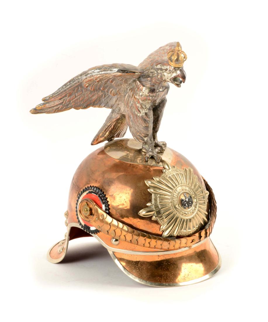 Cuirassier Helmet of the Guard, Officer's Pattern,: Officer's copper-alloy helmet surmounted by silver-plated eagle wearing gold crown. Scale chinstraps with two cockades. Copper-alloy visor, neck guard and silver edging. Starburst plate with black eag