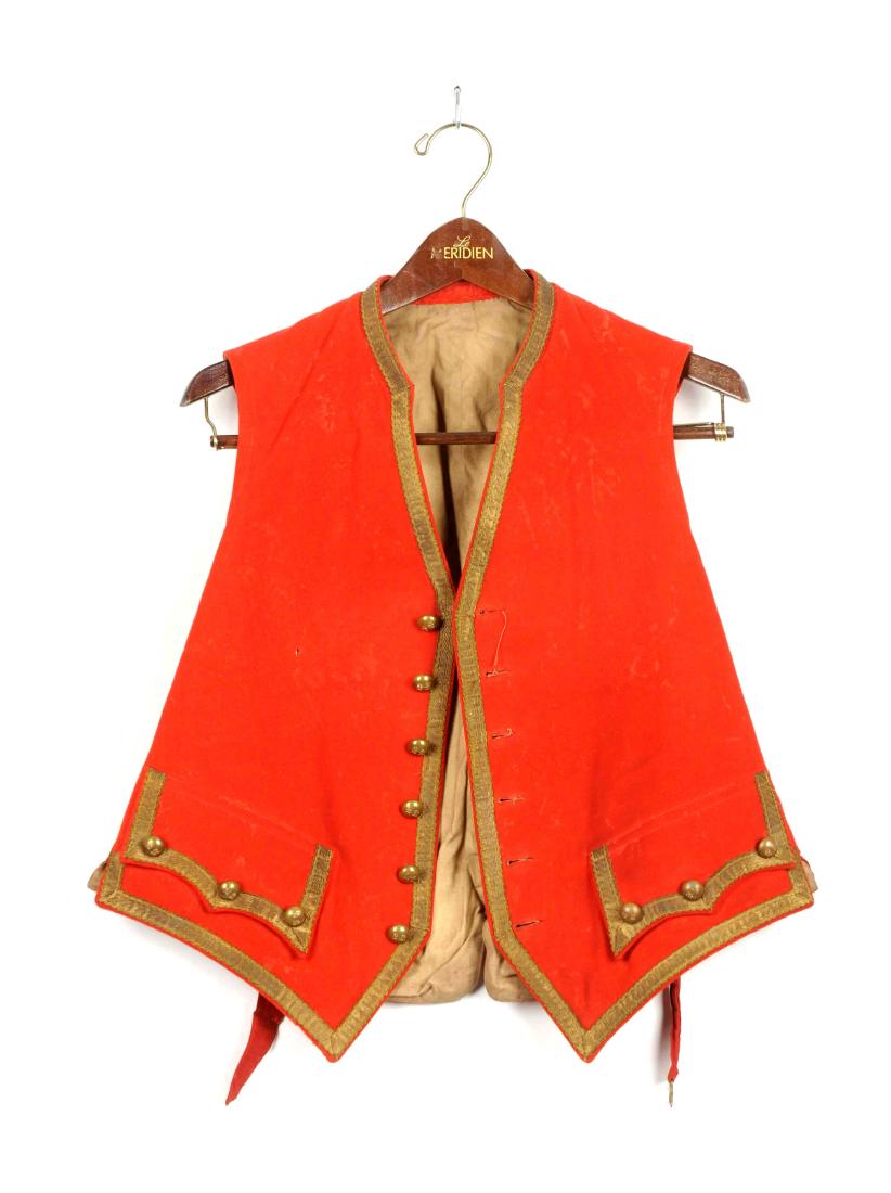 Waistcoat.: Scarlet wool waistcoat with gold bullion trim around collar and down front. Two small pockets with gold bullion trim and three buttons each. Brass convex buttons bearing "SS" in gothic script on face.