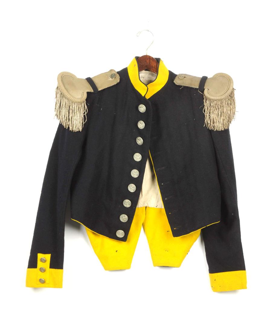 French Reproduction Napoleonic Kurtka.: Of navy blue wool with yellow stand-up collar, sleeve facings, piping and lower lining. Single breasted. French costumer stamp and white lining. Fringed silver bullion epaulettes, all original 19th ce