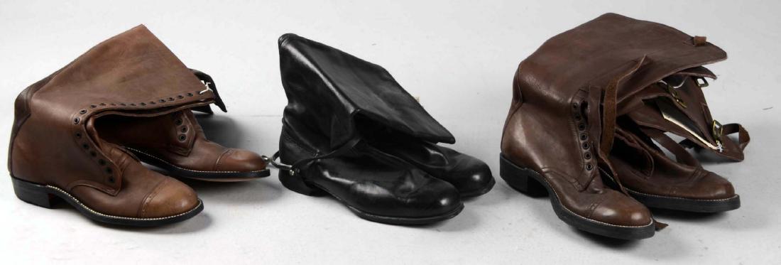 Lot of 3: Pairs of Reproduction Military Boots.: Comprised of: 1) Reproduction Brown leather military style boots with string ties and buckle attachments. 2) Reproduction Brown leather military style boots, no string ties. 3) Reproduction Black leat