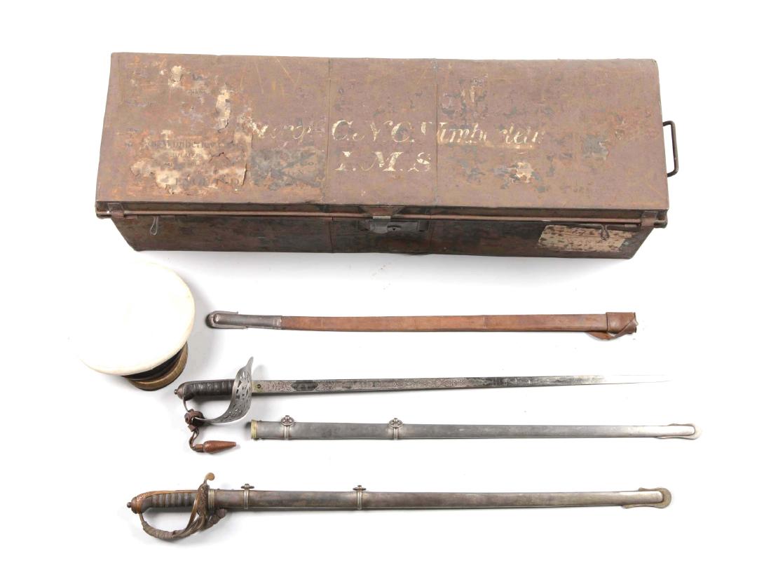 Lot Of 19: British Officer Or Diplomat Ensemble In Tin: British identified tin shipping container measuring 40-1/2" x 10-1/2" x 13" with 17 personal items. Top of the container has unreadable name and old shipping tag. Handle on both sides and lock on the