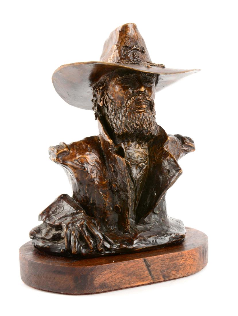 Remington Bronze "Trooper" Cavalry Statue.: Small bronze statue of U.S. military cavalryman. Stamped "Trooper" on back. Bronze measures 8" tall on 1" wood base, 6" wide at base.