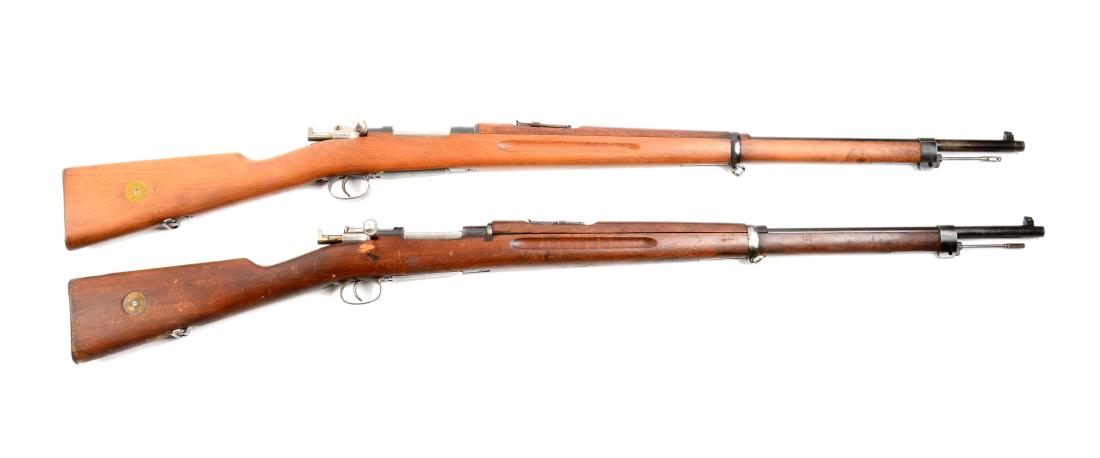 (C) Lot Of 2: Swedish Mauser Model 96 Military Bolt: Gun (A) is a Carl Gustafs 1902. Matching numbers on frame, bolt release, three times on bolt assembly, buttplate and both barrel bands. Floorplate is stamped "339". Hardwood stock and forend with bras
