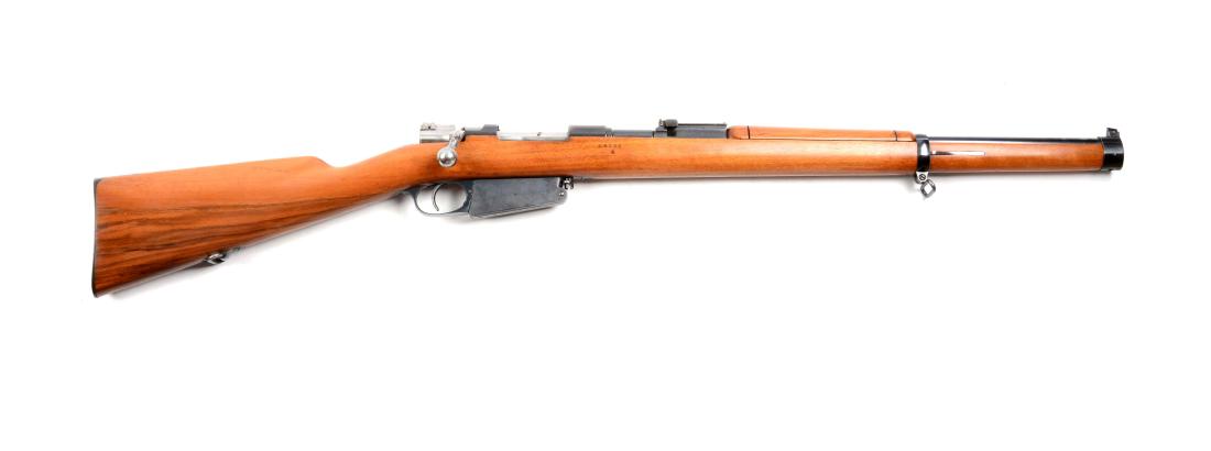 (C) High Condition Argentine Mauser Model 1891 Carbine.: These Mausers were made in Berlin, Germany by Ludwig Lowe and D.W.M. Has an integral five shot magazine, full length walnut stock, military sights, swept bolt, blued finish, two barrel bands and sling
