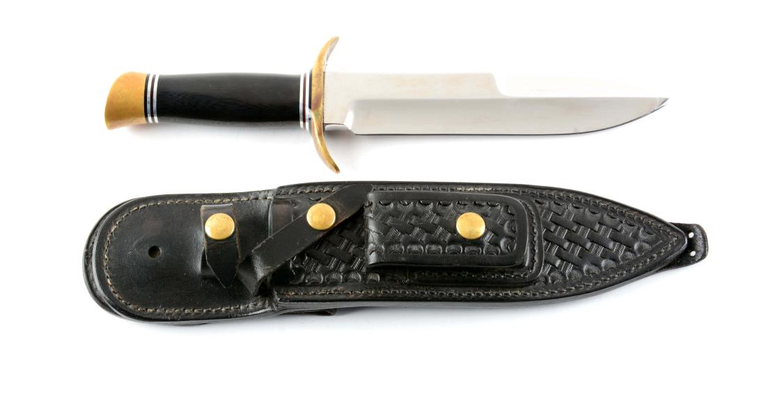 Draper Ephram, Utah Custom Fixed Blade Knife.: Done in a top false edge spear point with blade finish in spectacular mirror shine. Handle is done in black Micarta with heavy brass mounts. Full C guard. Correct basket weave leather sheath complete 