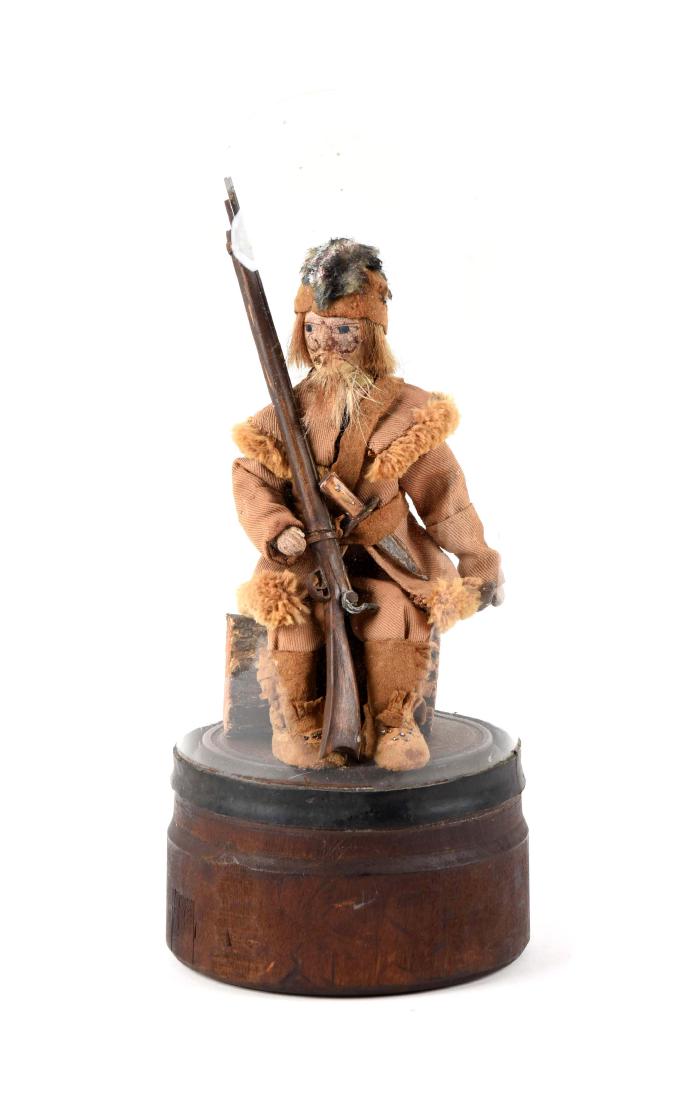 19th Century Pioneer Doll in Case.: This is a wonderful piece of pioneer or frontier folk art. The piece dates to the last quarter of the 19th century. There is a fully formed Daniel Boone style figure inside a glass dome. The model has