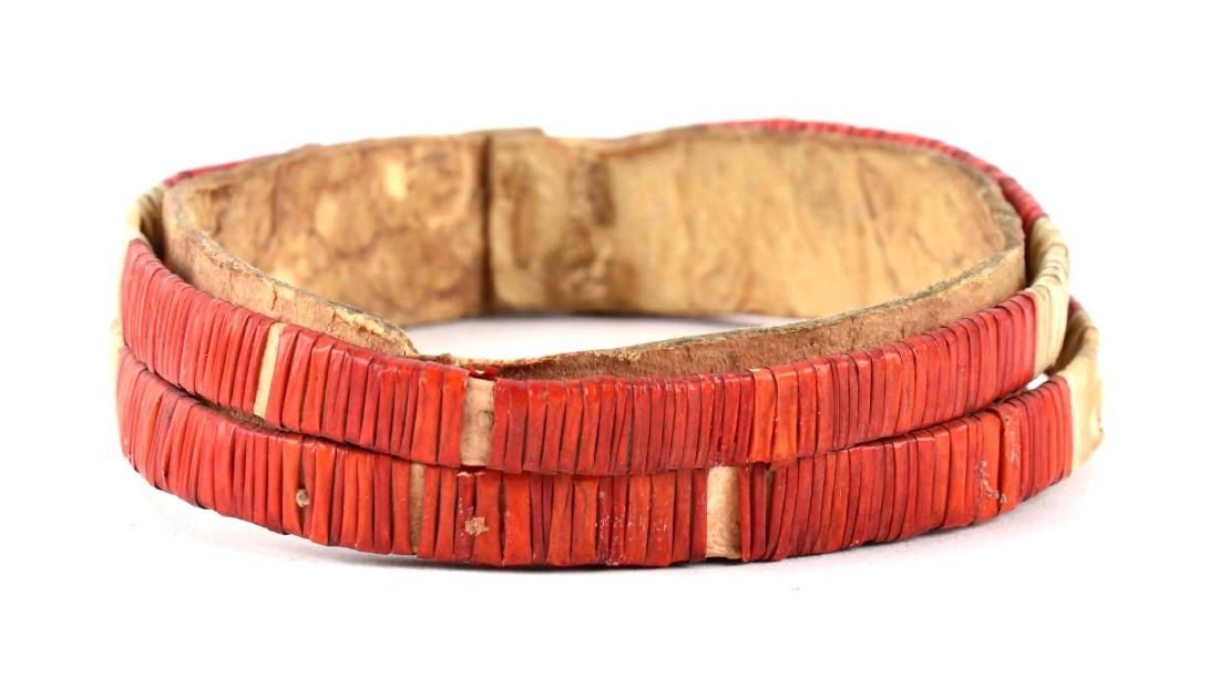 Native American Indian Plains Indian Quill Armband.: Circa 1850, this single armband is a rare find. The base is made of hide with great red and white colored quill work around the piece. There are minor areas of loss to the quillwork from age & use. Me