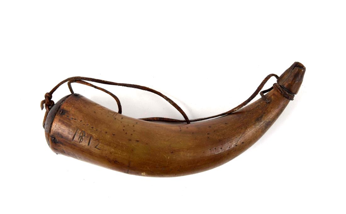 Dated 1812 Powder Horn.: The horn is also inscribed with the dates 1857, 1885, and 1899. It is initialed "HM". The powderhorn has a wonderful dark patina. There is some wear from age and use but overall, is in good condition.
