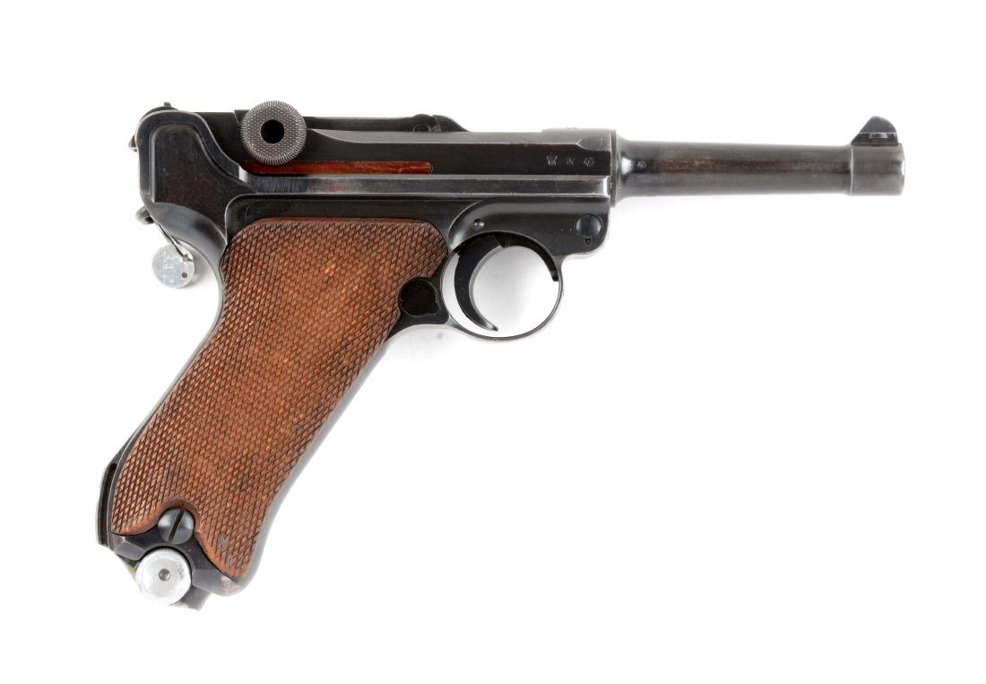 (C) 1939 Dated S/42 Luger Semi-Automatic Pistol.: Referred to as an S/42 Mauser code dated chamber Luger, manufactured by Mauser for the German military. This was the first military example to use the blued parts rather than the straw colored parts. 