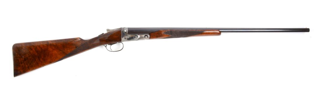 (C) Parker VH Grade Double Barrel Shotgun.: This shotgun was manufactured in 1937, the year Parker moved to Ilion, New York having been purchased by Remington in 1934. Shotgun has all matching numbers, matted solid rib with the old Meridian, Co