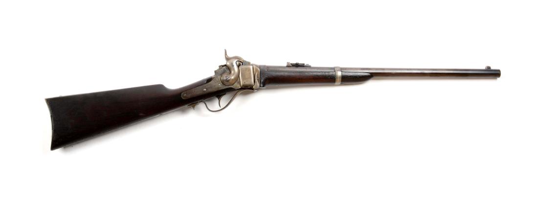 (A) Fine Sharps New Model 1863 U.S. Carbine Cartridge: Offered is an extremely fine all original Civil War Sharps carbine that was altered to take the center fire cartridge and was reissued for use during the Indian Wars. This model was manufactured with 