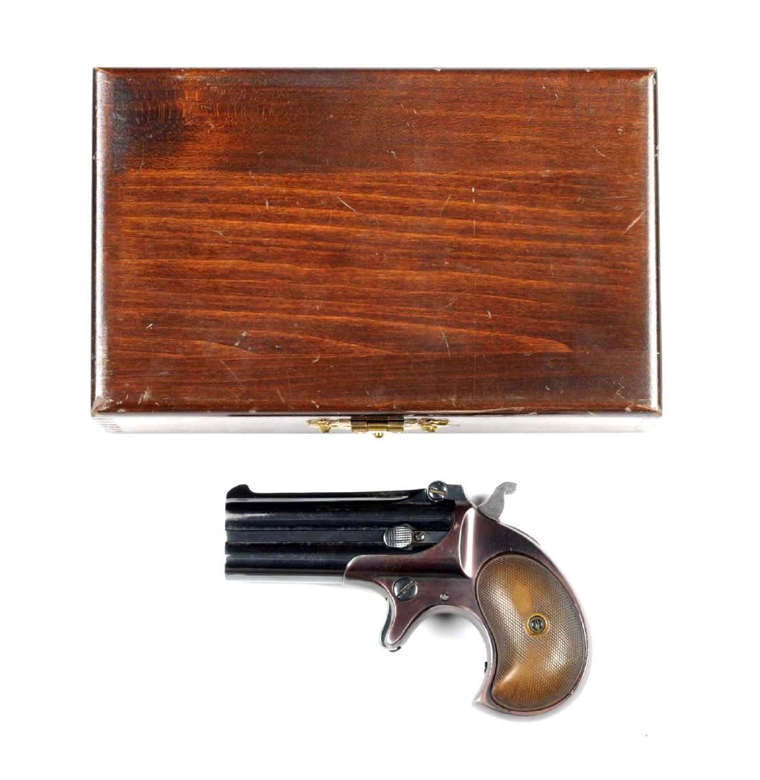 (C) Remington .41 Caliber Double Deringer.: Type Two Model No. 3. Manufactured from 1888-1911. Standard deringer for the .41 short rimfire. Over under 3" barrels, spur trigger, top hinge, single action, with checkered grips. Retains the majorit