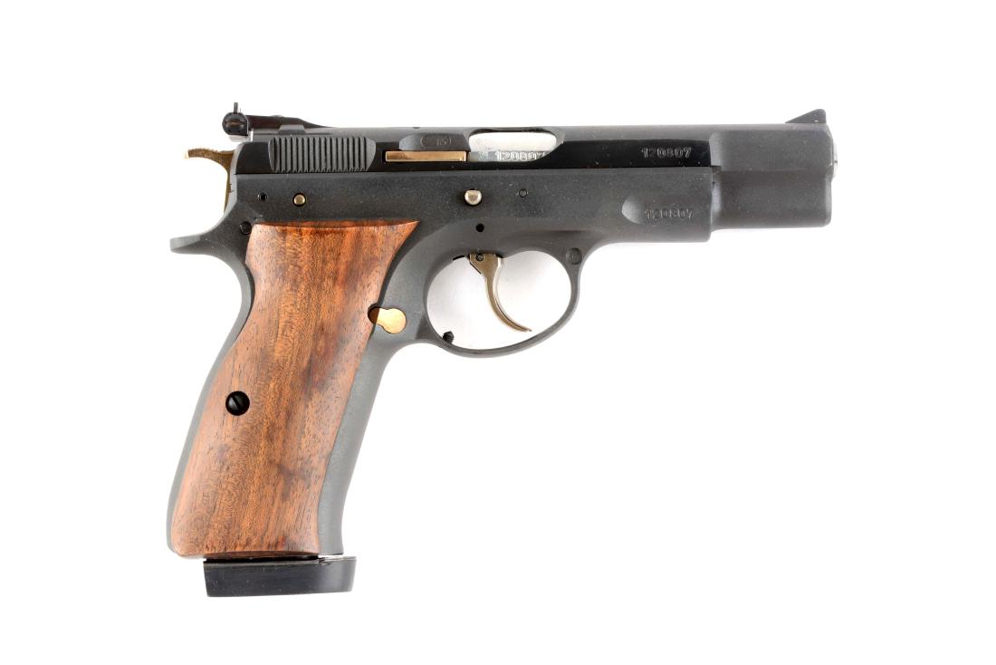 (M) CZ Model 75 9mm Semi Automatic Pistol.: This pistol is based on the Browning Hi-Power, but features the target adjustable rear sight, matte blued finish with gold trigger, safety, side lock and hammer. It is a double action. Gun shows in ne